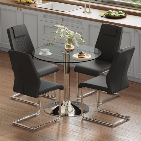 Ensemble table à manger avec chaises. Table à manger moderne en verre trempé de 85 cm de diamètre, combinée avec 4 chaises de salle à manger en PU noires avec pieds en métal argenté. Idéal pour salle 