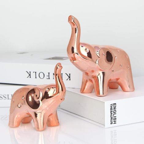 Paire d éléphants décoratifs style moderne pour salon et bureau sculpture pour étagère et meuble design (1/5)