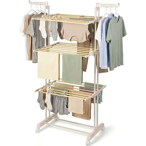 Todeco – Étendoir à linge intérieur 3 niveaux – Tubes effet bois – Ailes pivotantes – Châssis ivoire latte – Capacité pour vêtements et linge de lit (1/5)