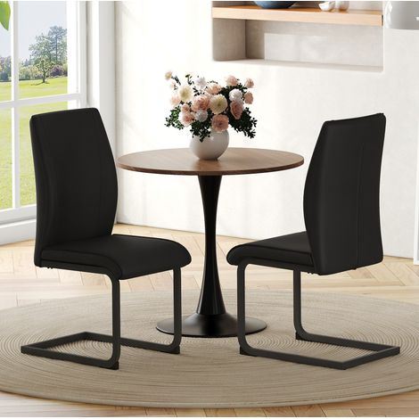 Pack de 2 sillas de comedor negras en polipiel con estructura de metal, respaldo ergonómico 50 cm (1/5)