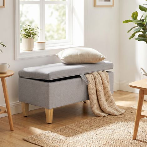 Banc avec rangement aspect lin. Repose-pieds rembourré avec pieds en hévéa. Coffre de rangement. Gris clair. (1/5)