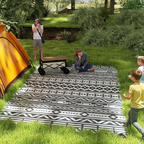Tapis bohème résistant aux intempéries, idéal pour terrasse et salon, style extérieur robuste et élégant