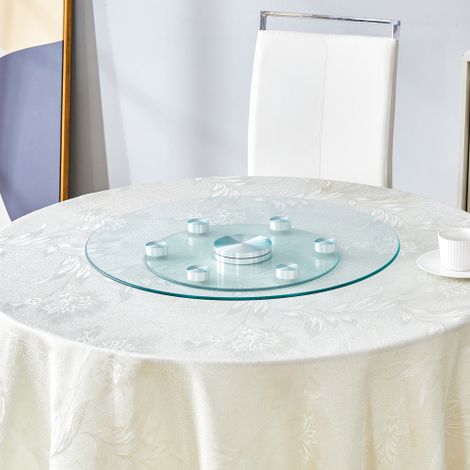 Mesa. Tablero de cristal redondo giratorio de dos niveles. El diámetro del cristal superior es de 61 cm, y el del inferior de 38 cm. Su diseño giratorio facilita la recogida y colocación de objetos. (1/5)