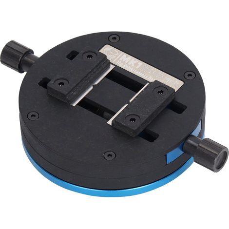 Le nouveau dispositif de réparation de puces de carte mère, doté d'une base rotative, s'utilise avec un microscope. (1/5)