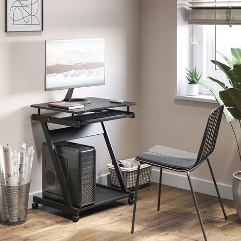 Bureau gain de place avec tablette clavier rétractable. 4 roulettes et une étagère inférieure. 60 x 48 x 73 cm. Noir.