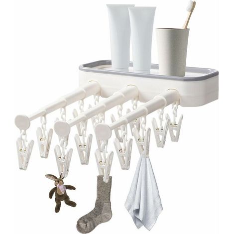 Étendoir à linge pliable pour chaussettes blanches sèches, idéal pour la cuisine et la salle de bain.