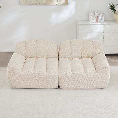 Modulares Sofa aus granuliertem Fleece in Beige-Weiß, rahmenlos, mit Ottoman und flexibel kombinierbaren Modulen (1/5)