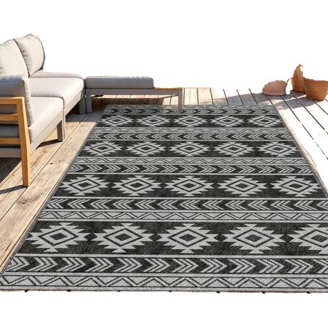 Alfombra de exterior, impermeable, resistente a los rayos UV, negra. (1/5)