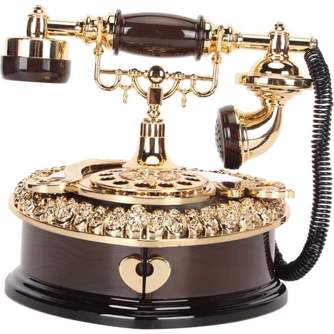 Coffret musical vintage en forme de cœur, design téléphone rétro élégant et innovant, mécanique de luxe pour décoration intérieure. (1/5)