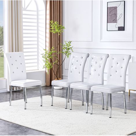 Set de 4 sillas de comedor tapizadas en polipiel blanca con patas de metal cromado (1/5)