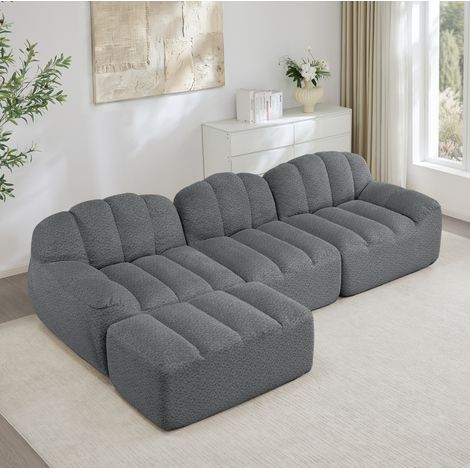Canapé modulaire d’angle 3 places gris en polaire granulée avec ottomane, assise profonde et structure sans cadre (1/5)