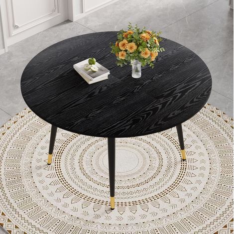 Mesa de comedor extensible redonda a ovalada 120x120 cm negra en MDF con patas metálicas doradas (1/5)