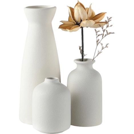 Ensemble de trois vases blancs décoratifs en céramique pour la décoration du salon et des compositions florales modernes (1/5)