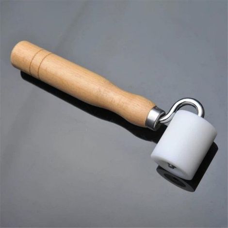 Outil de pose de papier peint à manche pour jointures, largeur 4 cm, pour une application précise et sans bulles sur vos revêtements muraux (1/5)