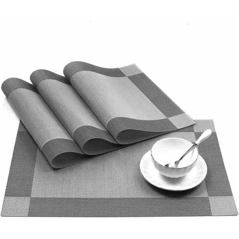 Lot de 8 sets de table lavables, résistants à la chaleur et antidérapants en PVC avec isolation thermique. (1/5)