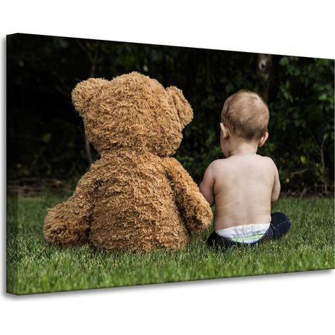 Lienzo impreso Niño con un osito de peluche 90x60 cm
