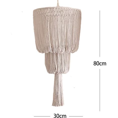 Un abat-jour en corde de coton tissée à la main, de style nordique, qui peut être accroché au mur d'une chambre ou d'un appartement comme élément décoratif.