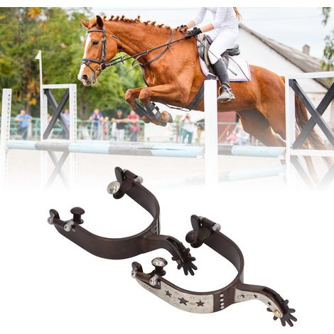 Une paire d'éperons de cowboy western vintage en laiton marron, d'une qualité exceptionnelle, ornés d'étoiles, convenant aux jardins extérieurs, à l'équipement équestre et aux accessoires. (1/5)