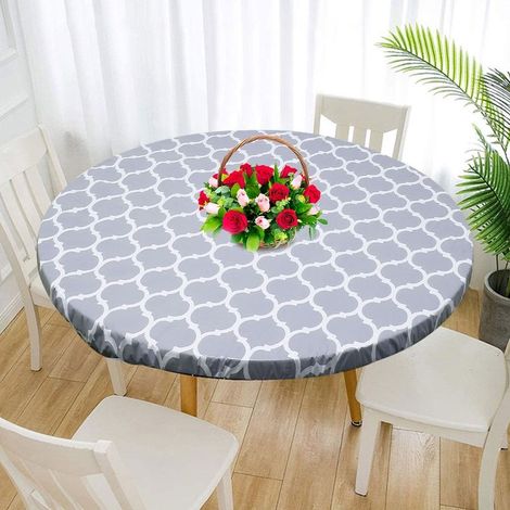 Runde elastische Tischdecke, Basis aus Flanell mit Blumenmuster, mit Gummizug, wasserdicht und leicht mit einem Schwamm abzuwischen. (1/5)