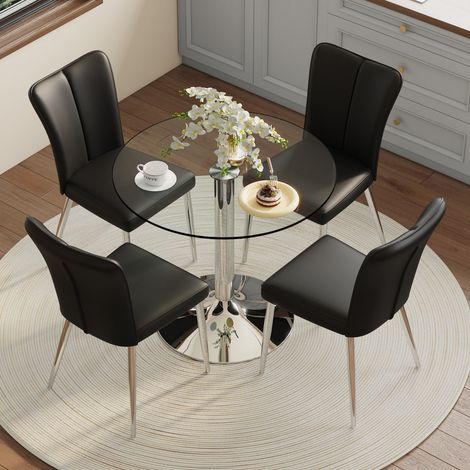 Table à manger ronde verre sécurité 85cm avec 4 chaises PU noires pieds soutien argentés salle à manger cuisine.