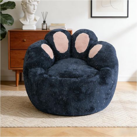 Fauteuil lounge sculptural inspiré des pattes, aux contours incurvés, pour une ambiance à la fois ludique et raffinée.