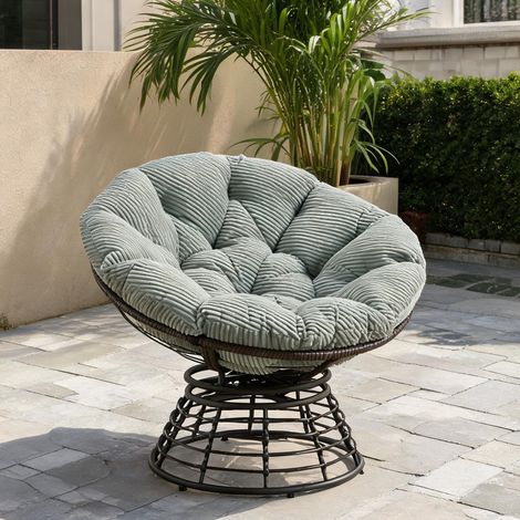 Fauteuil Papasan en rotin pivotant 360° avec coussin vert (1/5)