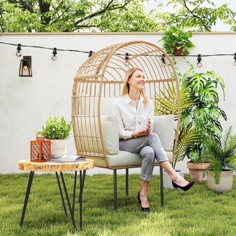 Fauteuil œuf rotin coussin amovible rembourré,mobilier extérieur résistant intempéries,balcon patio design rond confortable,finition beige.