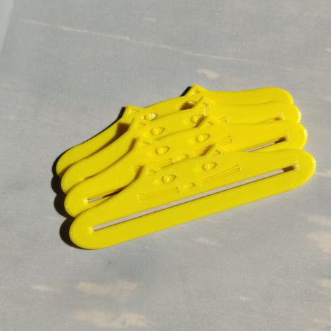 Lot de 4 presse-sachets pour nourriture pour chat —Outils distributeurs portables en forme de chat pour presser les sachets de pâtée