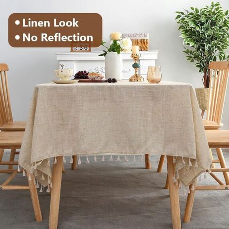 Beige, fleckenabweisende, waschbare Tischdecke mit Quasten