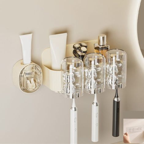 Simpatico portaspazzolino a forma di orsetto con dispenser automatico di dentifricio. Portaspazzolino da parete con 3 tazze. (1/3)
