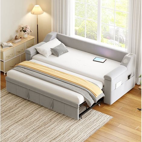 Divano letto imbottito in velluto grigio chiaro 90x190/180x190 cm con Bluetooth, USB, vani portaoggetti e rete a doghe (1/5)