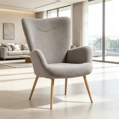 Poltrona lounge grigia con schienale alto, braccioli integrati e struttura in acciaio DESVIAE (1/5)