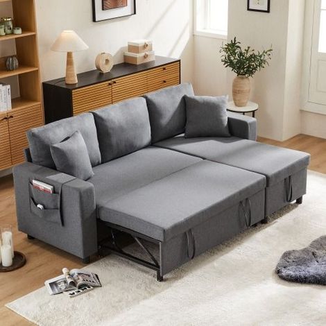 Canapé d’angle convertible 3 places en tissu gris foncé, méridienne réversible, coffre de rangement, poches latérales et 2 coussins (1/5)