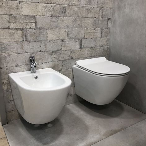 Conjunto de Sanitarios Suspensos Rimless sin brida línea redonda, dimensiones reducidas, tapa con cierre suave