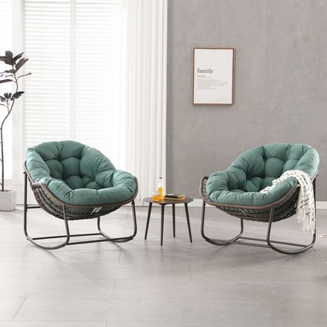 Poltrona a dondolo da esterno in rattan sintetico con cuscino verde MODENUIT (1/5)