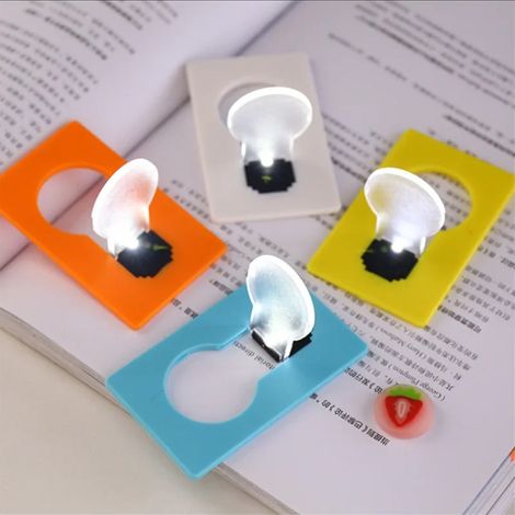 Lampe de nuit LED portable et élégante, pliable et facile à glisser dans un sac ou un portefeuille. (1/5)