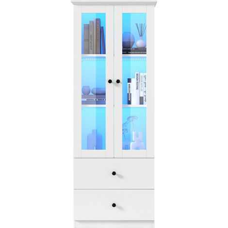 Vitrine LED moderne, de couleur blanche mate, haute de 165 cm. La commande à distance est dotée de 16 touches colorées. Il s’agit d’une vitrine en verre avec 2 tiroirs. Matériau utilisé : MDF.