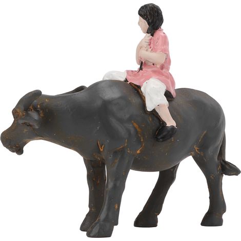Statuette miniature artisanale d'un buffle d'eau représentant une jeune fille à dos de buffle, idéale pour la décoration de table. (1/5)