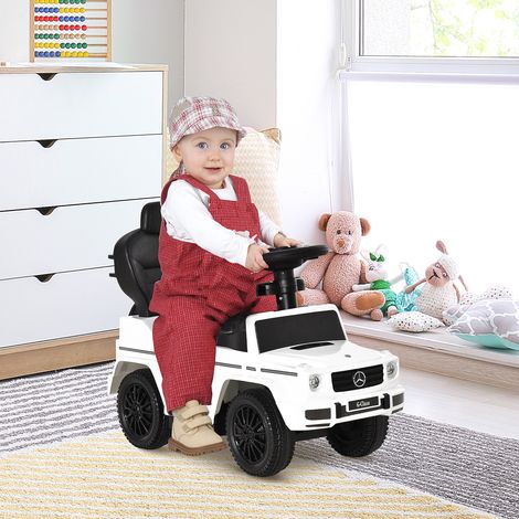 Voiture électrique Mercedes G350 sous licence pour enfants de 1 à 3 ans, avec klaxon, toit amovible et barre d'appui, capacité de charge de 25 kg, dimensions : 85,5 x 40,5 x 95 cm, blanche. (1/5)