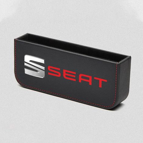 (SEAT) Boîte de rangement multifonctionnelle pour l'espace entre le siège conducteur et le siège Seat, côté conducteur, avec support pour téléphone. (1/5)