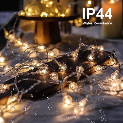 Guirnalda de luces de 10 m de largo con 80 esferas LED, luz fija/modo intermitente, IP44, pilas AA (32,8 pies) (1/5)