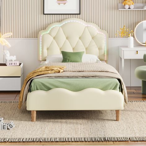 Cama individual tapizada moderna 90x200 cm en PU beige, cabecero ondulado con LED multicolor y somier de láminas (1/5)