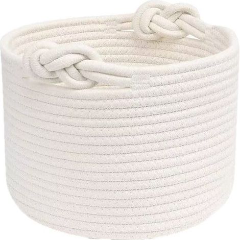 Esta cesta de almacenamiento tejida en algodón es perfecta para habitaciones infantiles, baños y dormitorios. Dimensiones: 25 x 18 cm (blanca). (1/4)