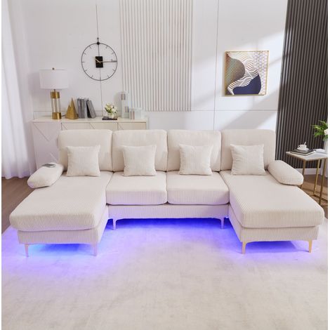 Divano angolare modulabile 265x135x88 cm in velluto beige, LED e USB-C per soggiorno FloraGrace