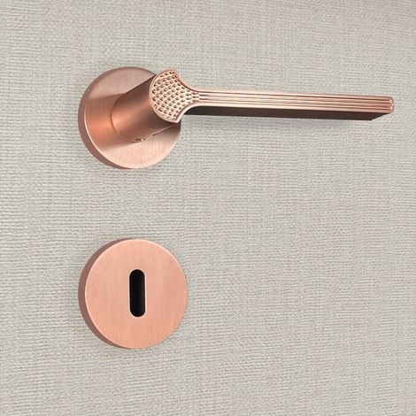 Poignée de porte design à clé finition aspect or rose Cristina - KATCHMEE