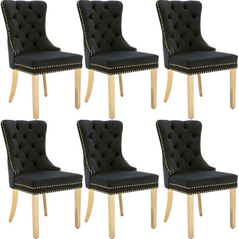 Sedia da pranzo in velluto nero con schienale capitonné e gambe dorate MODENUIT (1/5)