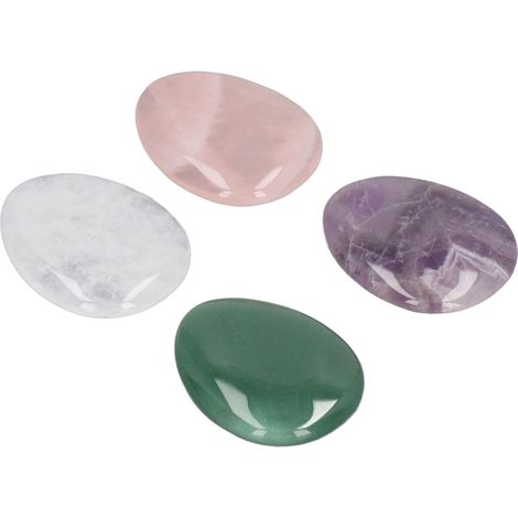 Quatre pierres anti-stress roses, violettes, vertes et blanches, fabriquées à partir de matériaux naturels, utilisées pour soulager le stress et masser l'anxiété.