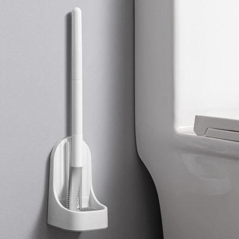 Eine weiße Silikon-Toilettenbürste in Form eines Golfschlägers mit weichen, schnell trocknenden TPR-Borsten für eine 360°-Toilettenreinigung, inklusive tropffreiem Bürstenhalter. (1/5)