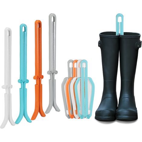 Porte-bottes pliable avec pinces réglables, adapté aux bottes hautes. (1/5)