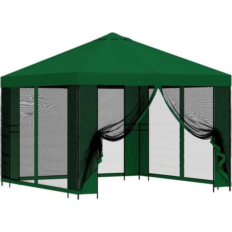 Le chalet de jardin a des murs de 3 x 3 mètres et est fabriqué en fibre de polyester verte et en acier. (1/5)